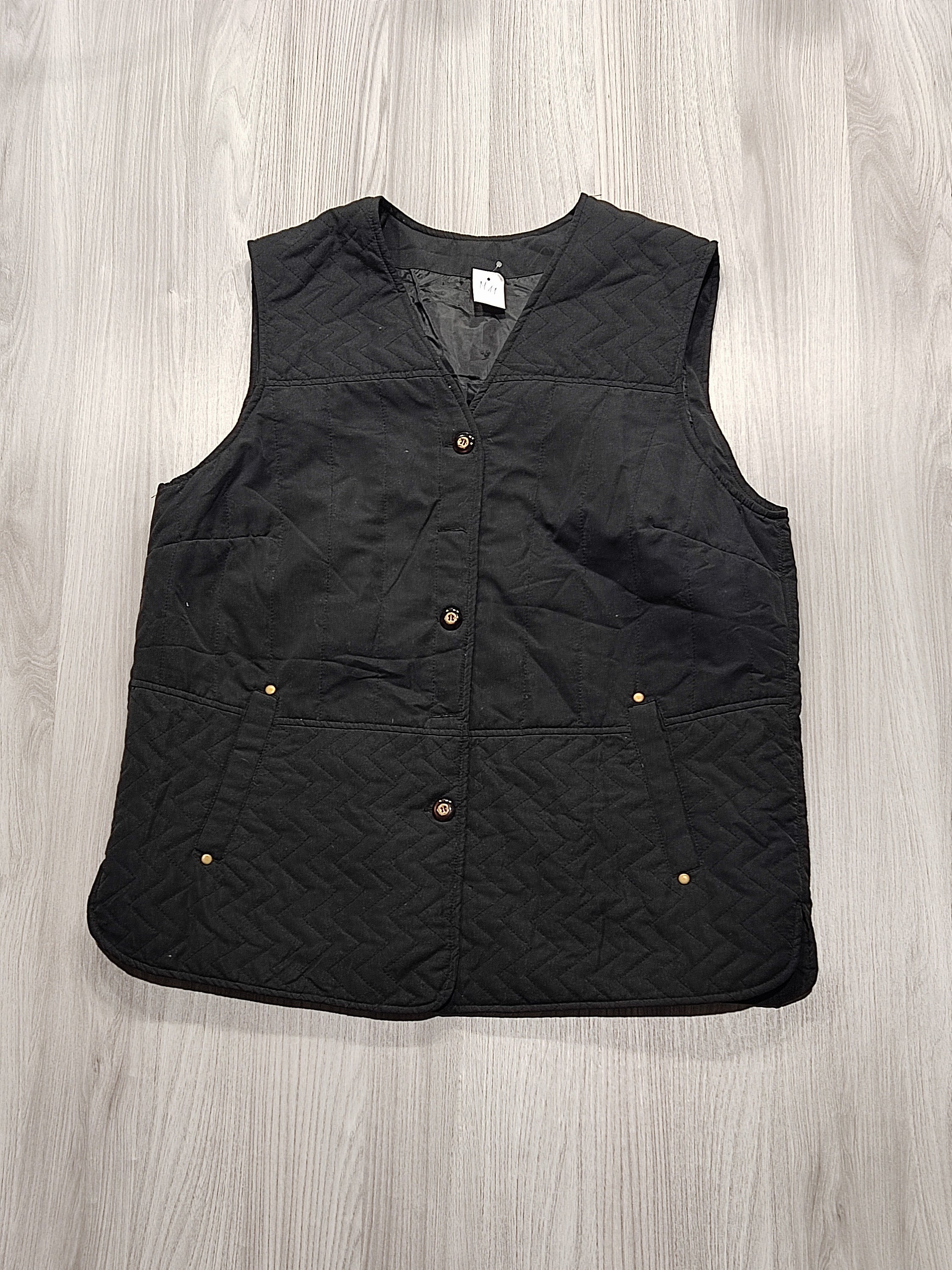 Ismeretlen fekete steppelt nõi mellény