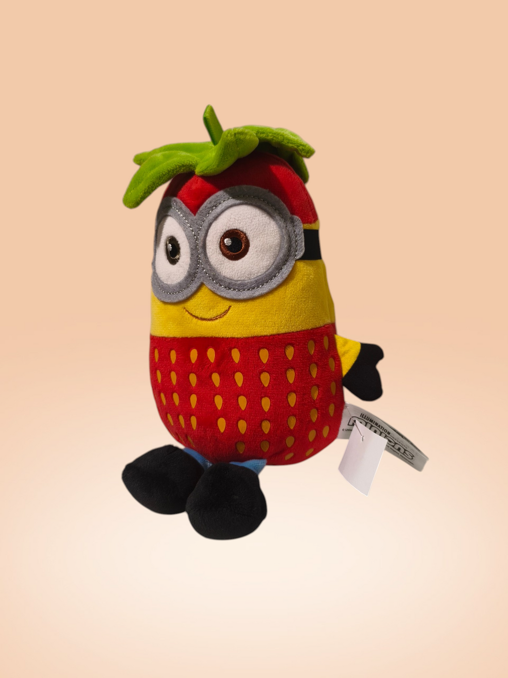 Minion eper jelmezben plüssfigura