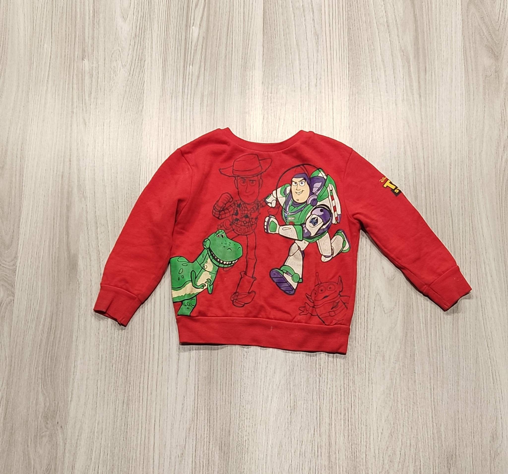 Piros Toy Story mintás pulóver