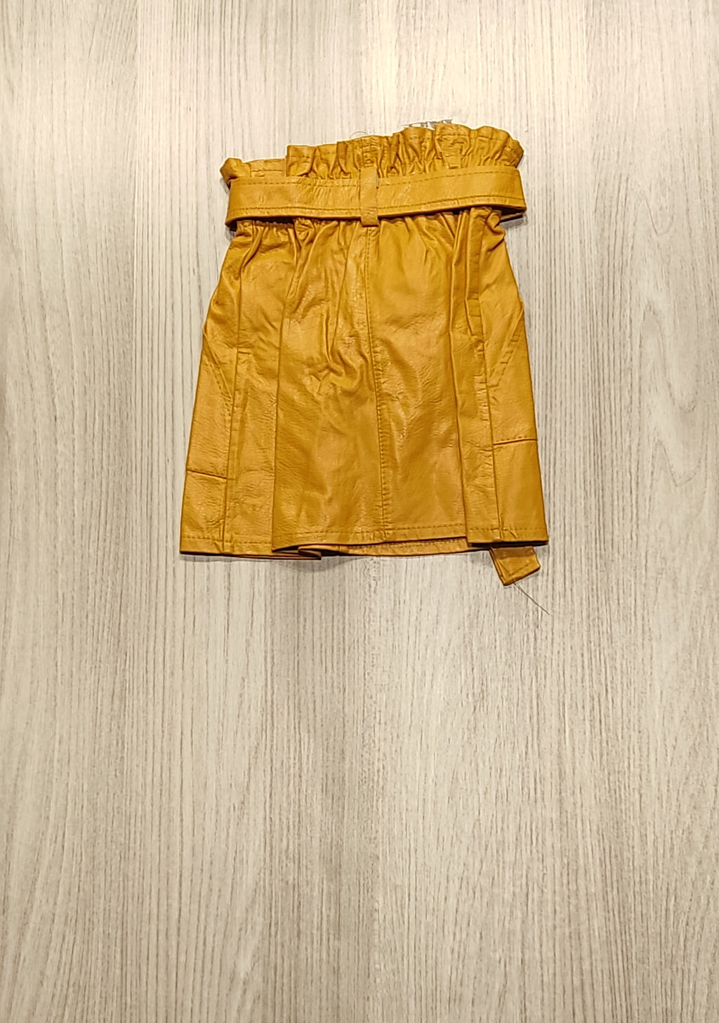 Ism. mustársárga mûbõr szoknya
